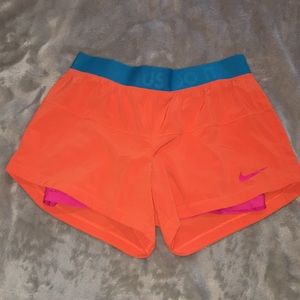 nike orange and pink shorts